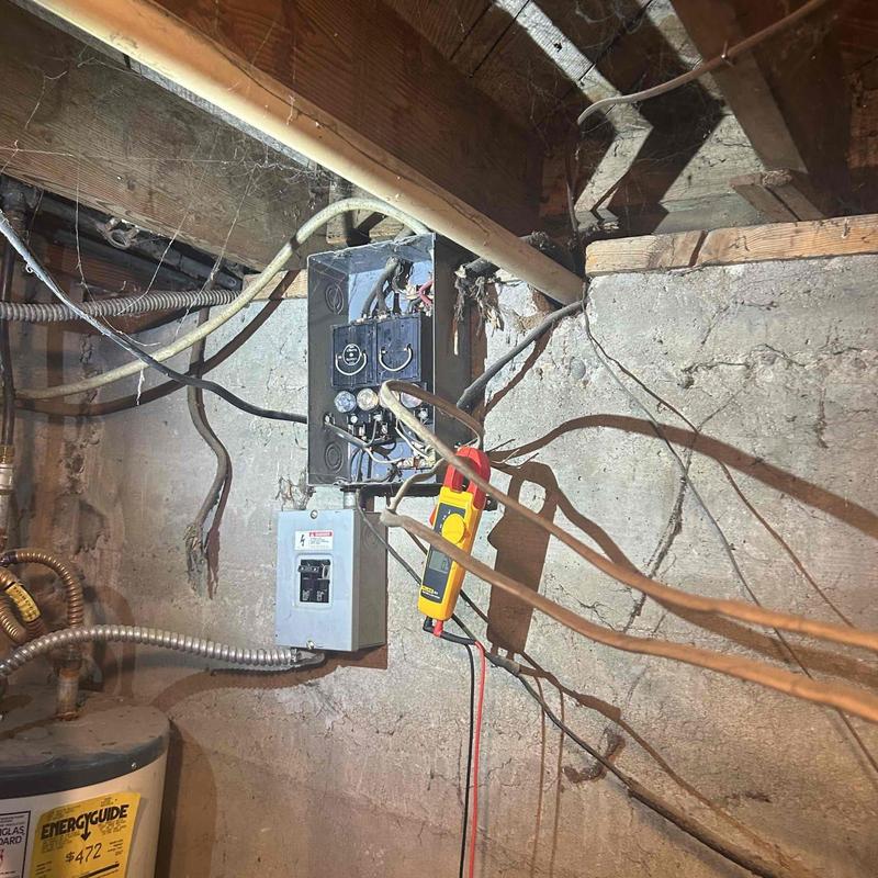 Old basement tube electrical panel with testing device Old basement tube electrical panel with testing device