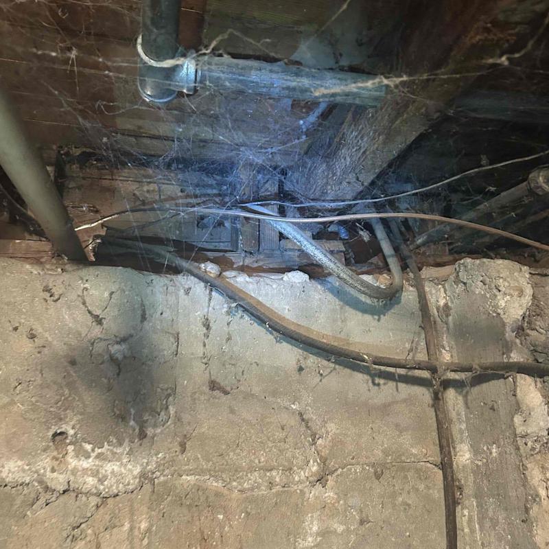 Old electrical tubing with code violations in basement Old electrical tubing with code violations in basement