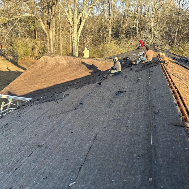 Roof decking removal on residential house roof Roof decking removal on residential house roof
