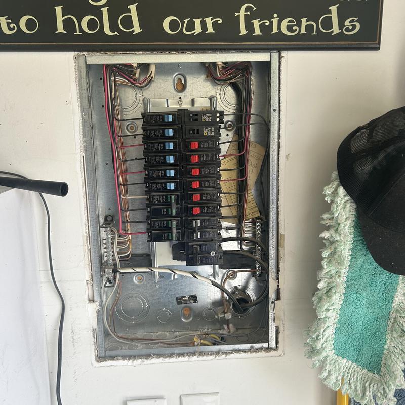 Circuit breaker panel with wiring and breakers installed Circuit breaker panel with wiring and breakers installed
