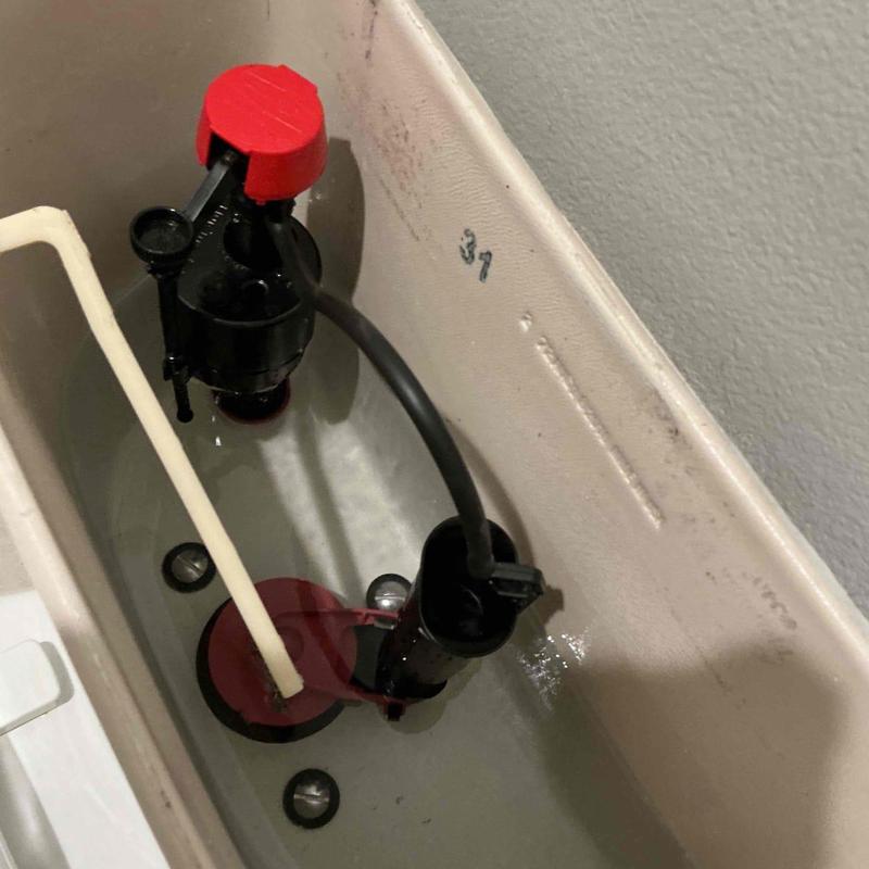 Toilet flush valve and flapper replacement inside tank