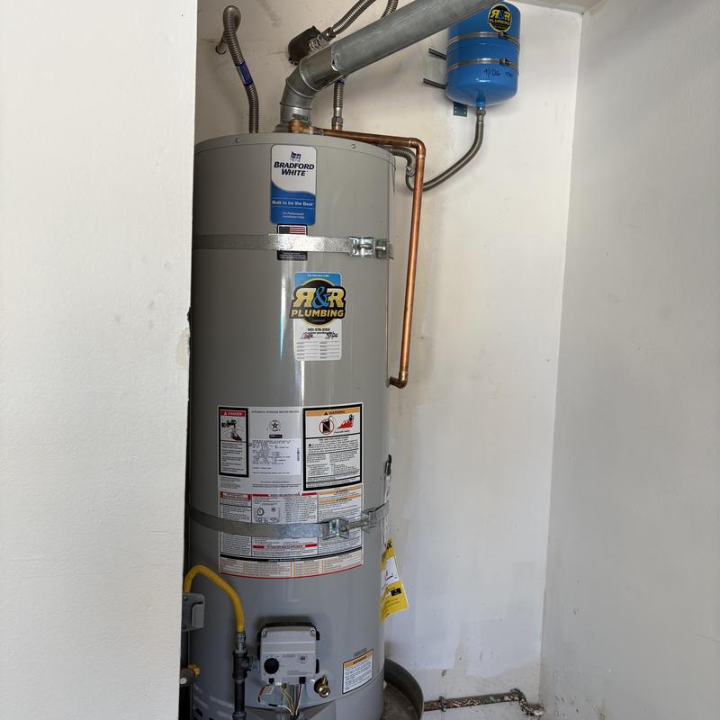 Bradford White water heater with new piping installed
