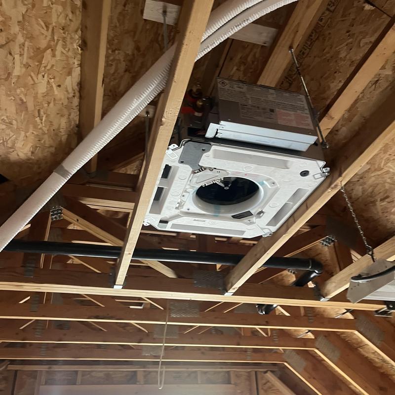 Mitsubishi ceiling cassette HVAC unit installation in attic Mitsubishi ceiling cassette HVAC unit installation in attic