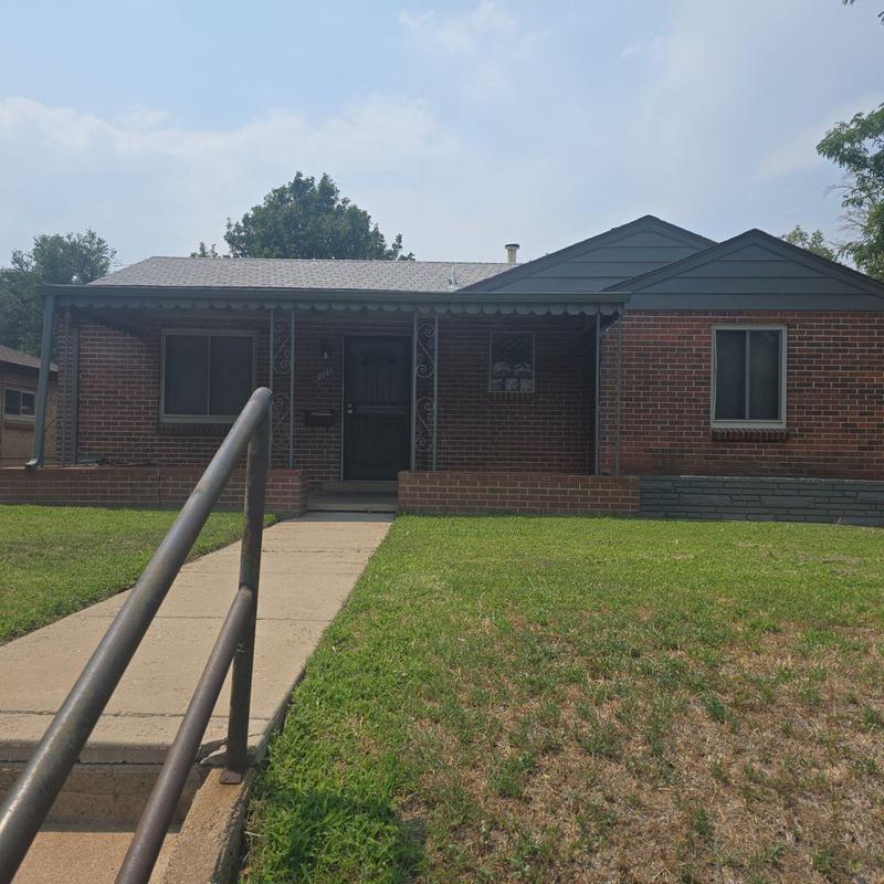 Flat roof with hail damage and weathered shingles Flat roof with hail damage and weathered shingles