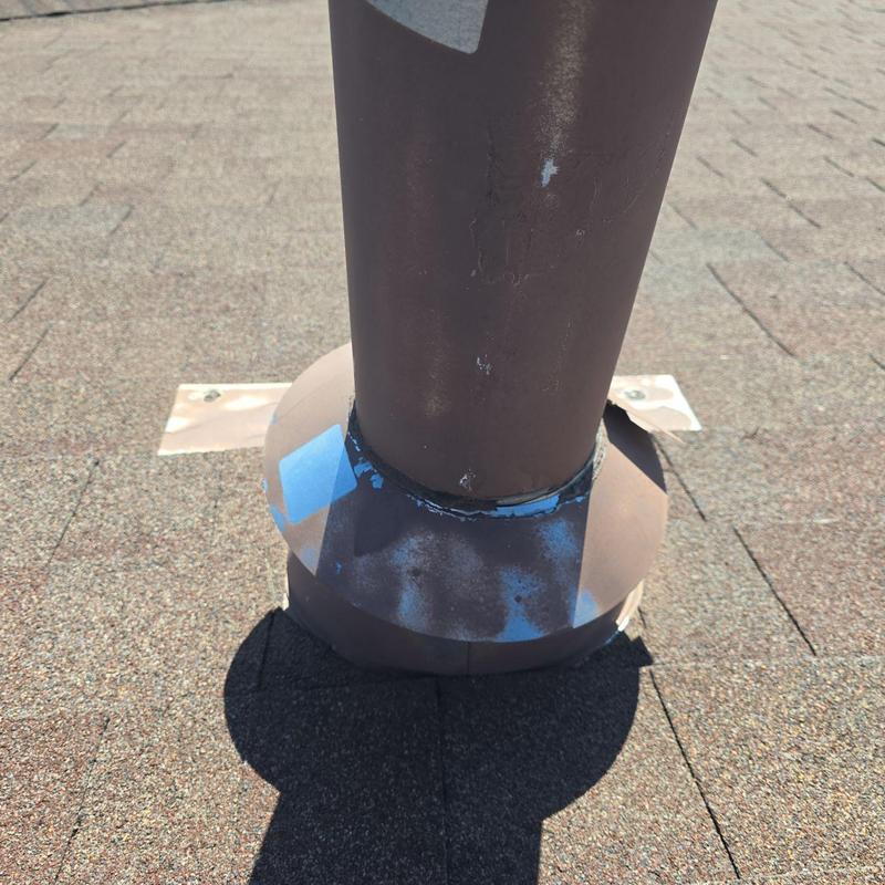 Pipe jack storm collar with sealant on shingle roof Pipe jack storm collar with sealant on shingle roof