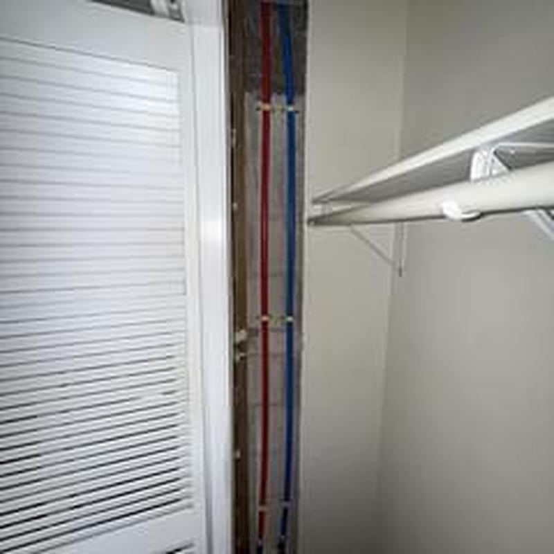34 PEX water lines installed in bathroom closet wall