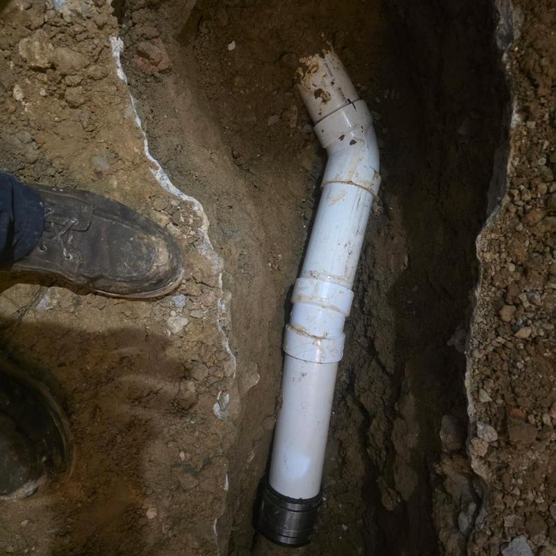 Sewer pipe replacement inside foundation and outside trench