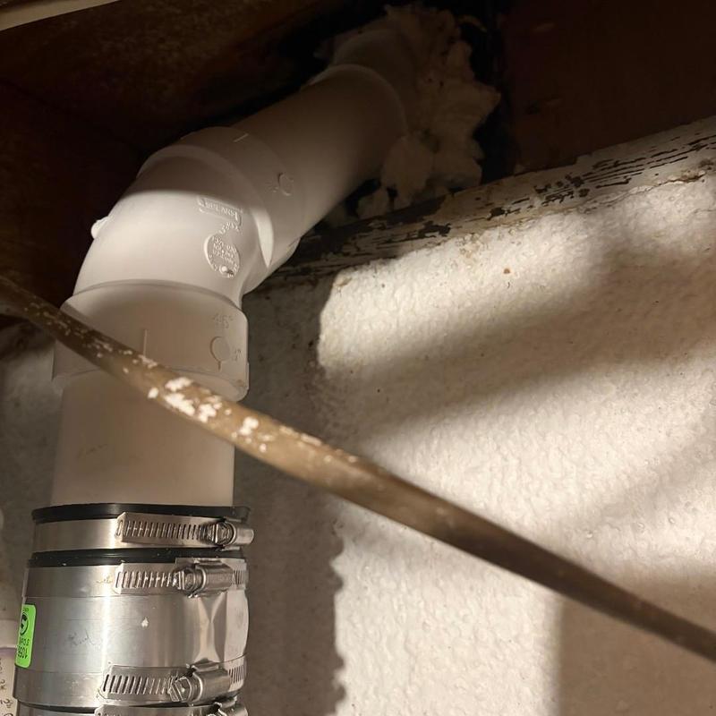 PVC drainage pipe with metal coupling installation