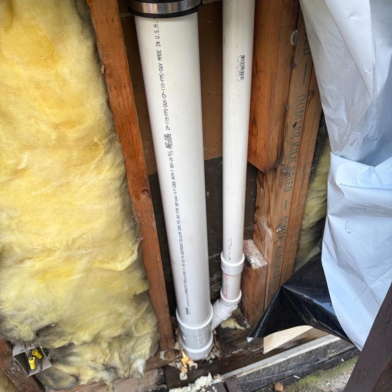 PVC drain pipe replacement with insulation and framing