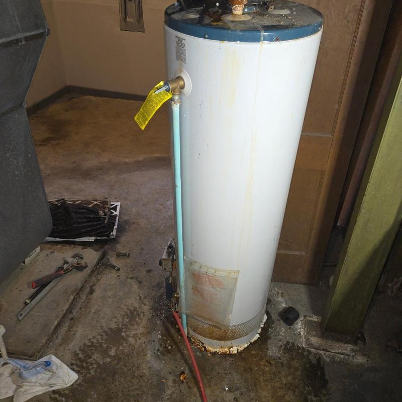 Water heater with corrosion and pipe connections