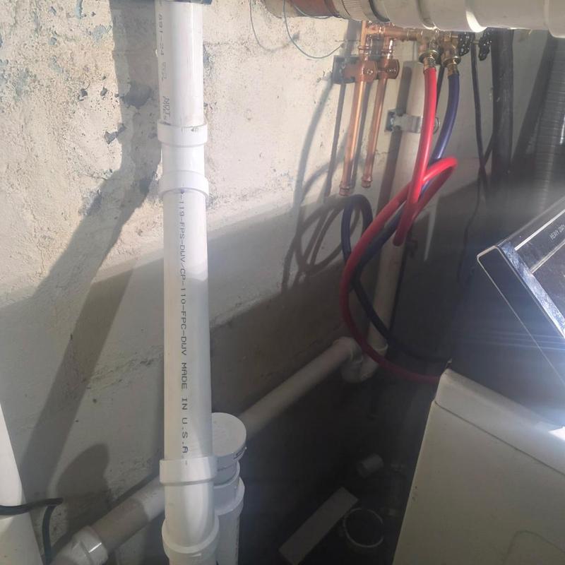 Bucket pump installation with new boiler drain pipes