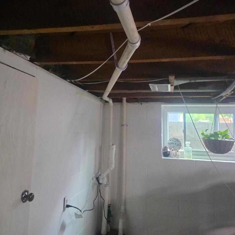 Boiler drain and bucket pump installation in basement