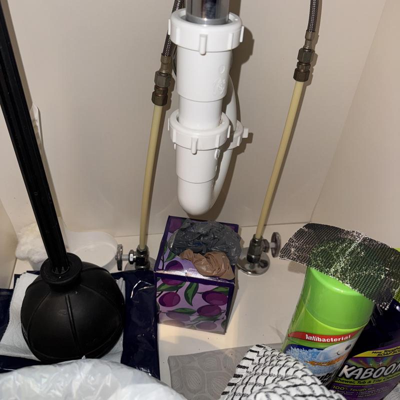 Master bathroom faucet shutoff valves and pipes under sink Master bathroom faucet shutoff valves and pipes under sink