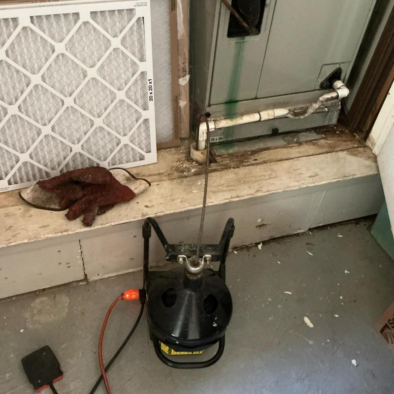 AC drain pipe cleaning with cable auger tool