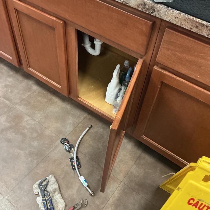 Supply line replacement under kitchen sink cabinet