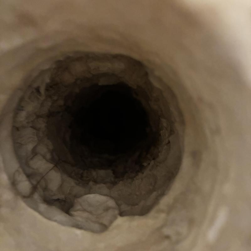 Shower drain interior with mineral buildup deposits