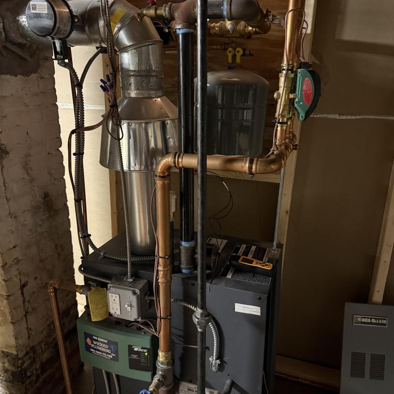 Copper piping on residential boiler system installation