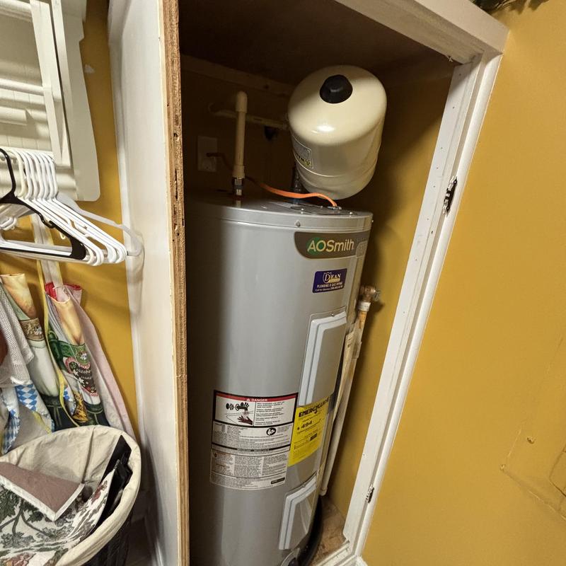 Water heater with thermal expansion tank in closet