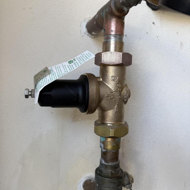 Wilkins 1-14 pressure regulator installed on copper pipe