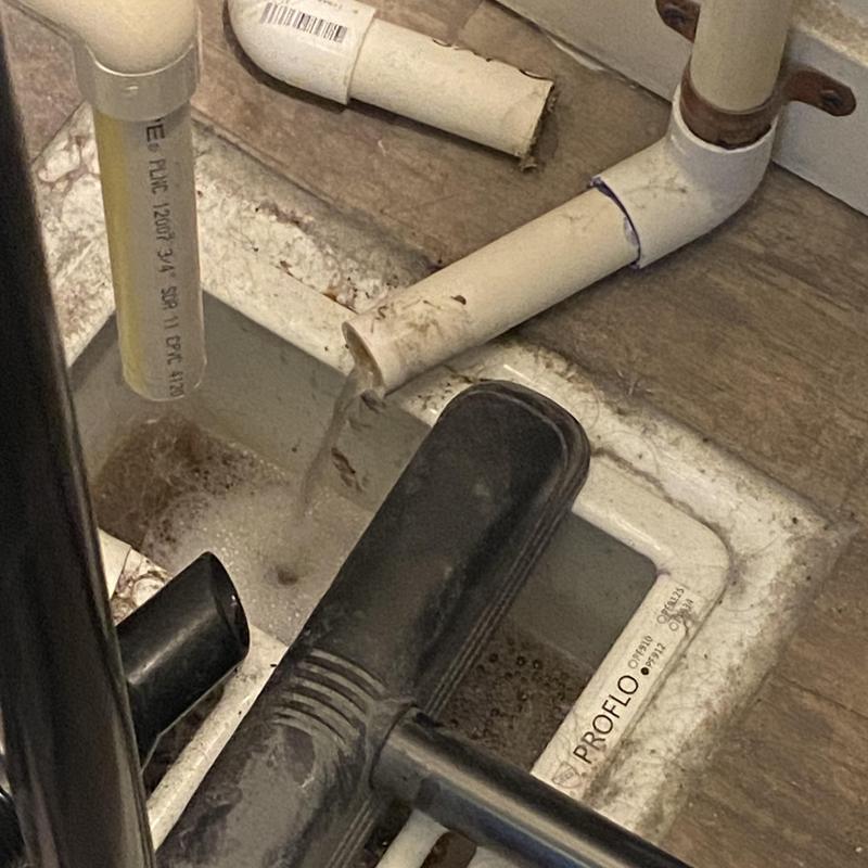Condensate drain line discharging water into drain pan Condensate drain line discharging water into drain pan