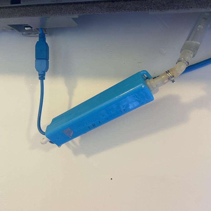 Mini split drain line with clamp and blue wiring Mini split drain line with clamp and blue wiring