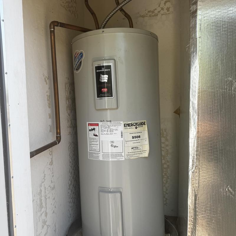 50-gallon electric water heater with copper pipes