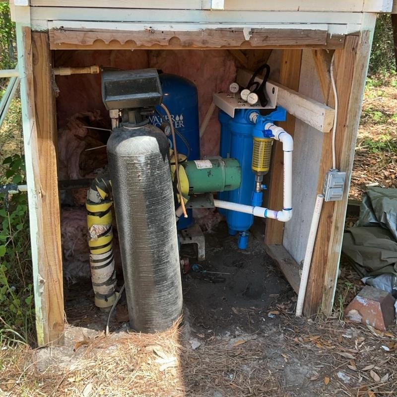 Well water filtration system with pressure tank installation Well water filtration system with pressure tank installation