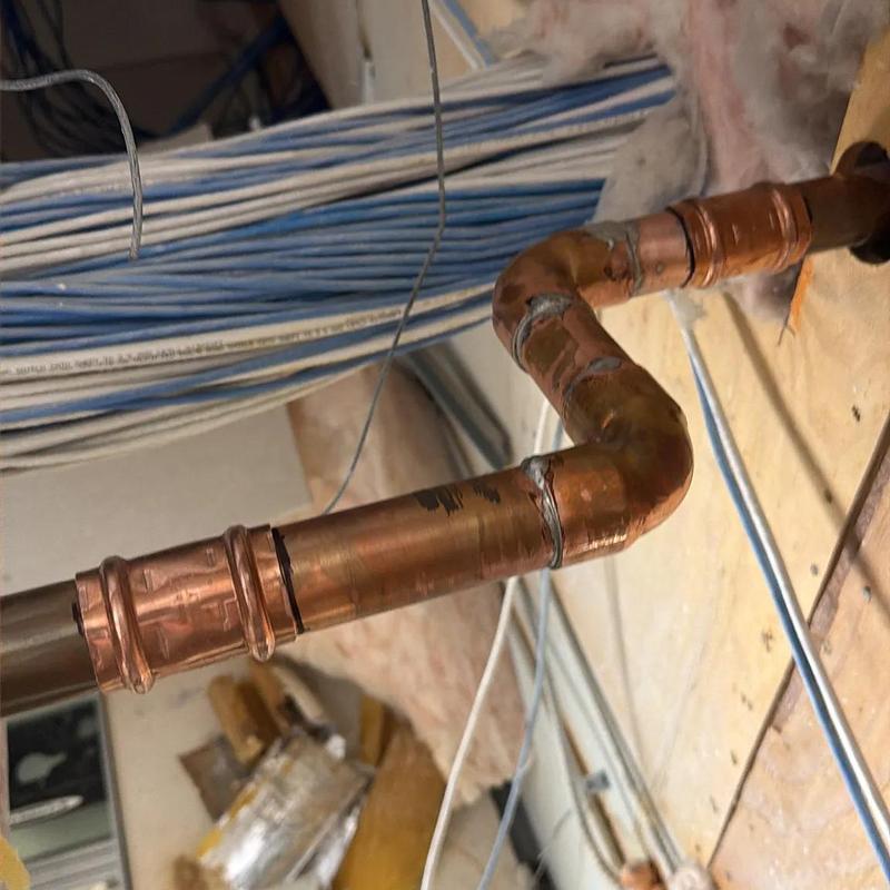 Copper hot water line with Pro Press fittings installed