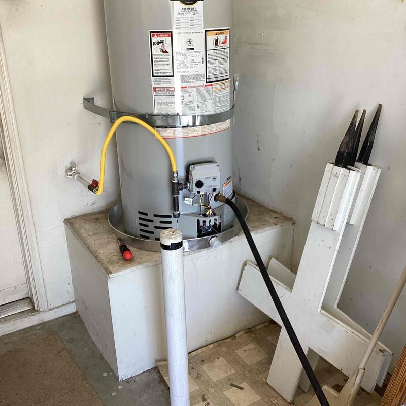 Water heater with flush hose attached Water heater with flush hose attached