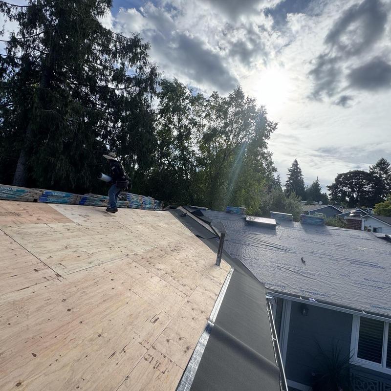 Roof underlayment installation on full shingle roof replacement