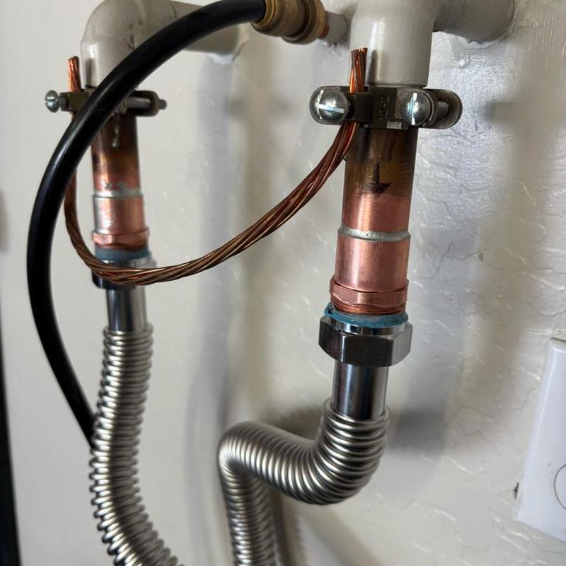 Water softener flex lines with copper adapters installed Water softener flex lines with copper adapters installed