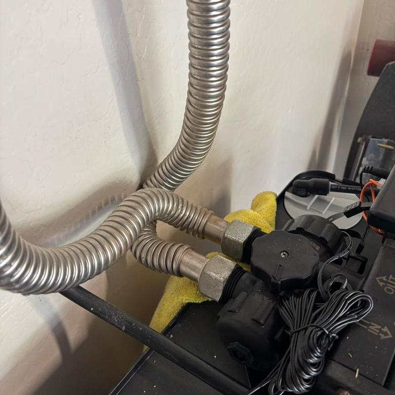 Water softener flex lines with adapters installed Water softener flex lines with adapters installed