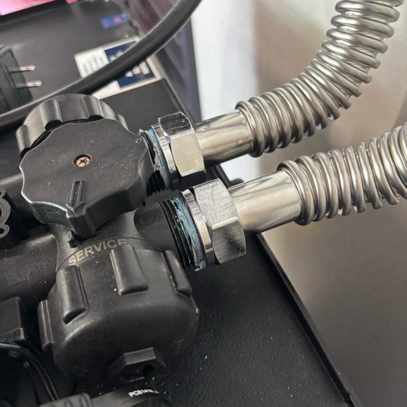 Water softener flex lines with new adapters installed Water softener flex lines with new adapters installed