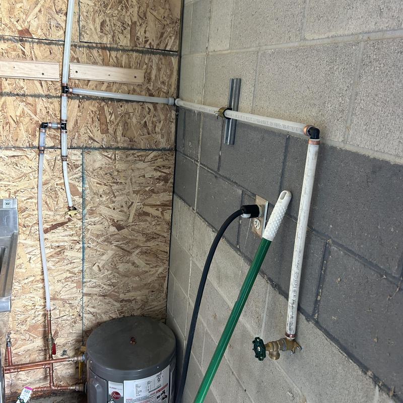 Point of use water heater with hose bib and piping Point of use water heater with hose bib and piping