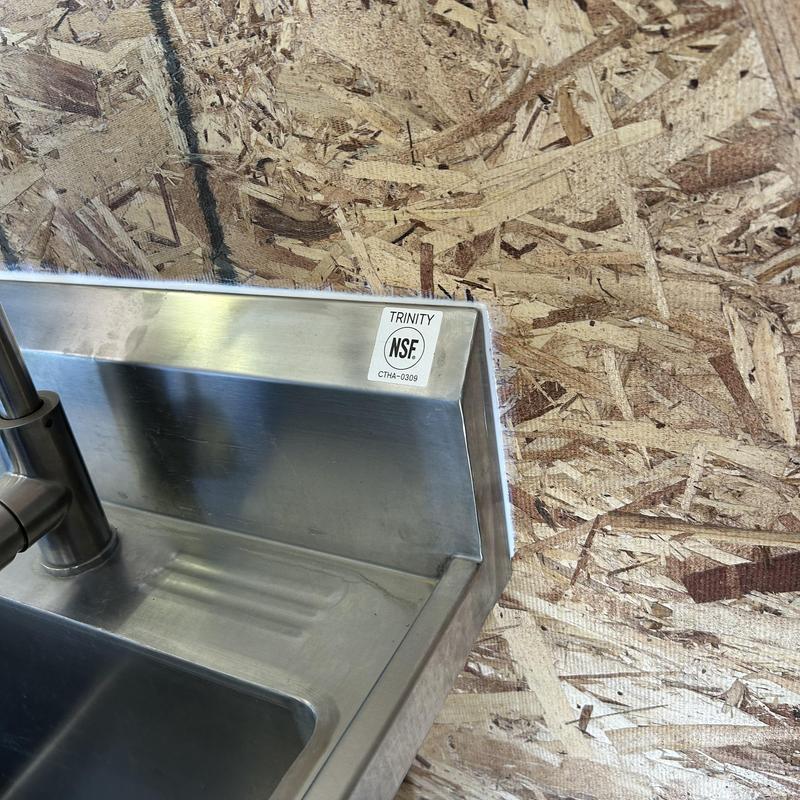 Stainless steel commercial sink and faucet installation Stainless steel commercial sink and faucet installation