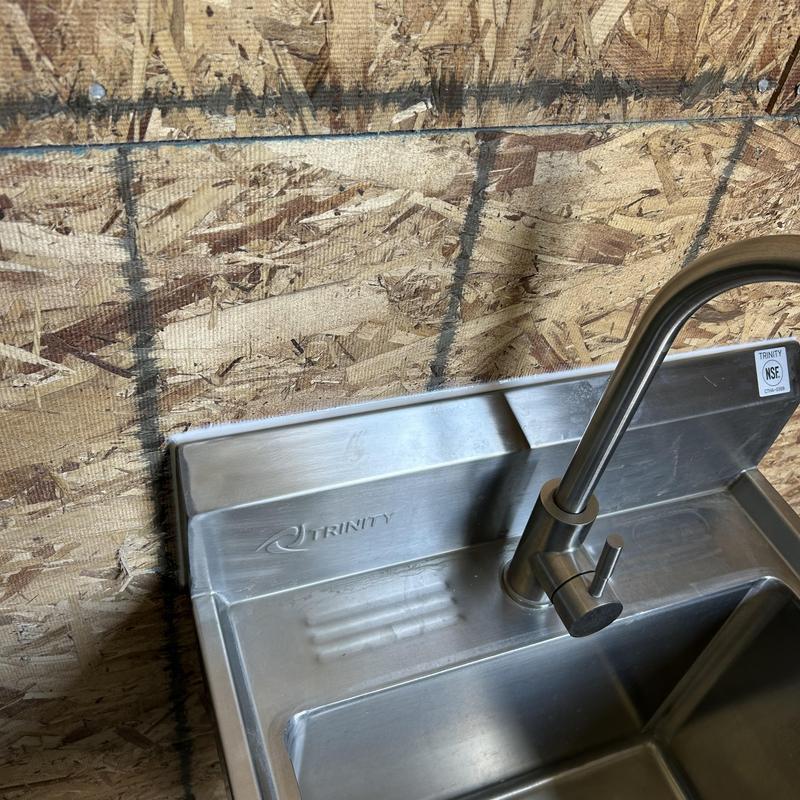 Stainless steel sink with faucet installation Stainless steel sink with faucet installation