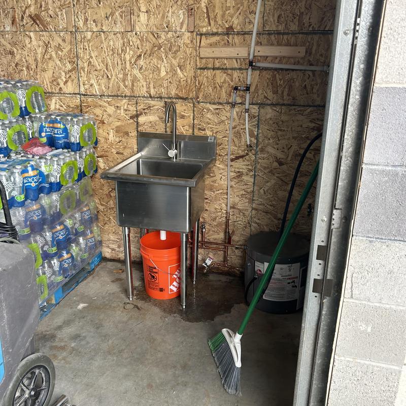 Point of use water heater and utility sink installation Point of use water heater and utility sink installation