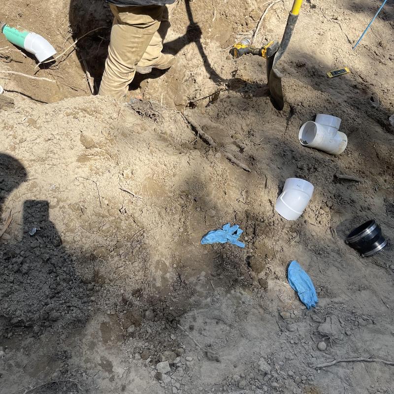 Sewer line excavation with PVC pipe fittings Sewer line excavation with PVC pipe fittings