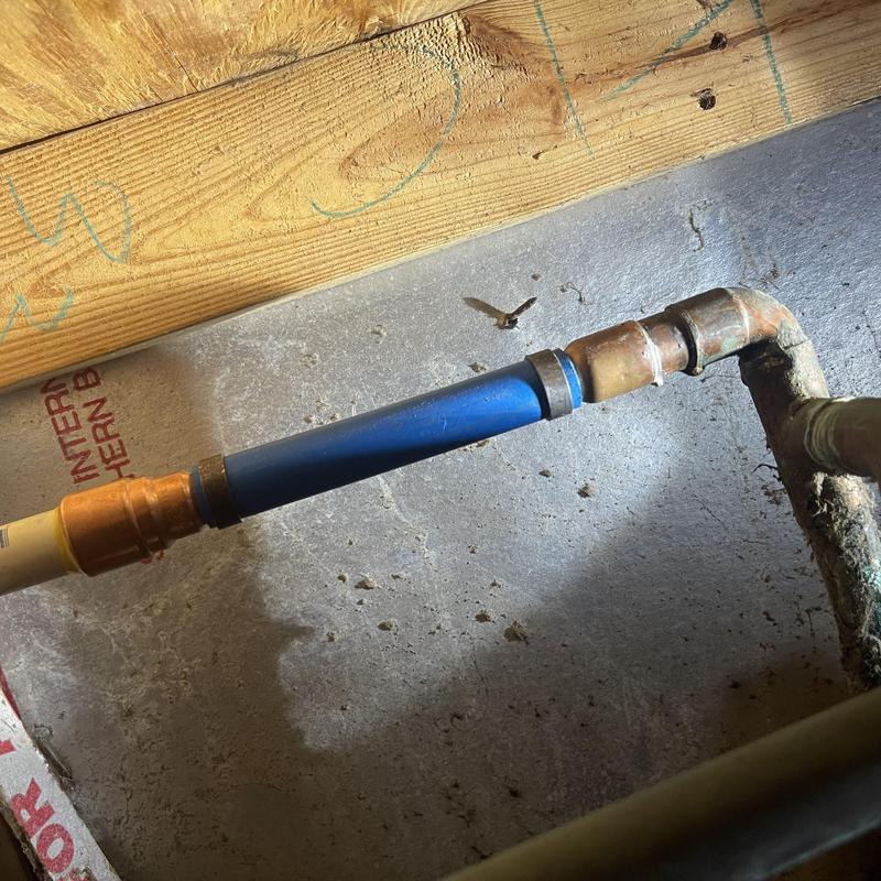 PEX pipe water line with copper fittings connection PEX pipe water line with copper fittings connection