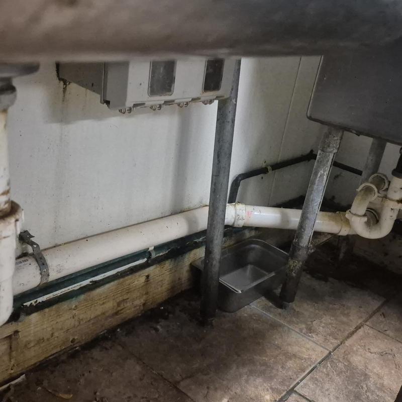 Kitchen sink PVC pipe with leak and clog repair setup Kitchen sink PVC pipe with leak and clog repair setup