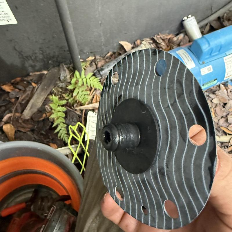 Backflow repair gasket seal with hand in Deerfield Beach