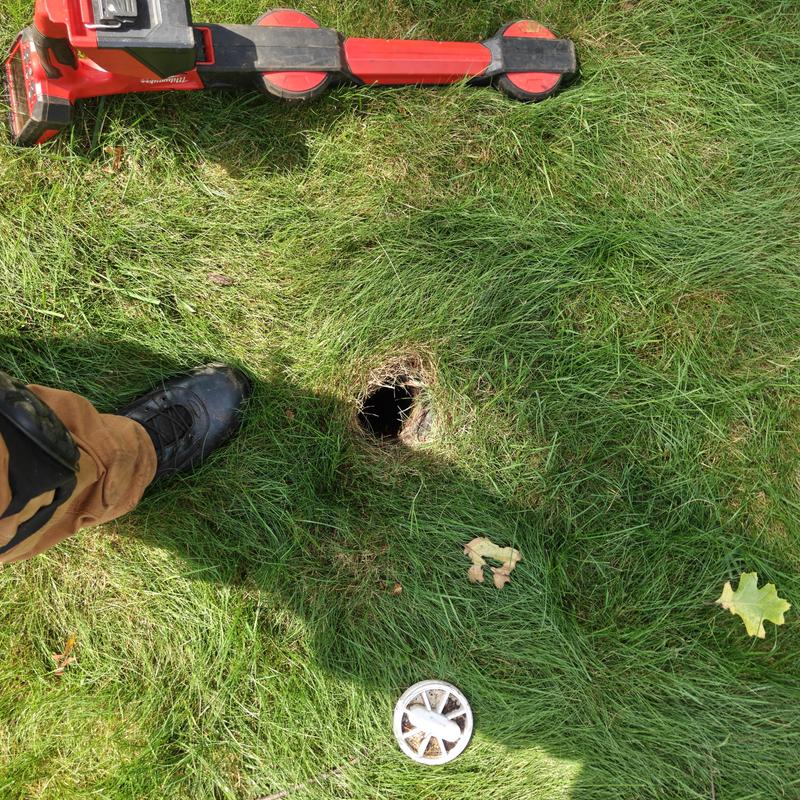 Sewer line camera inspection setup in grassy yard Sewer line camera inspection setup in grassy yard