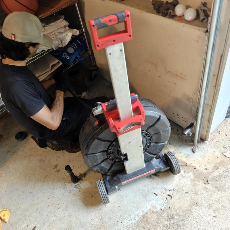 Sewer line camera inspection equipment and operator Sewer line camera inspection equipment and operator