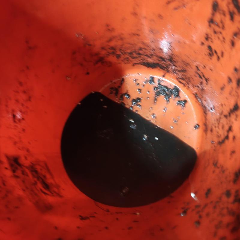 Laundry drain line inside orange pipe with debris Laundry drain line inside orange pipe with debris