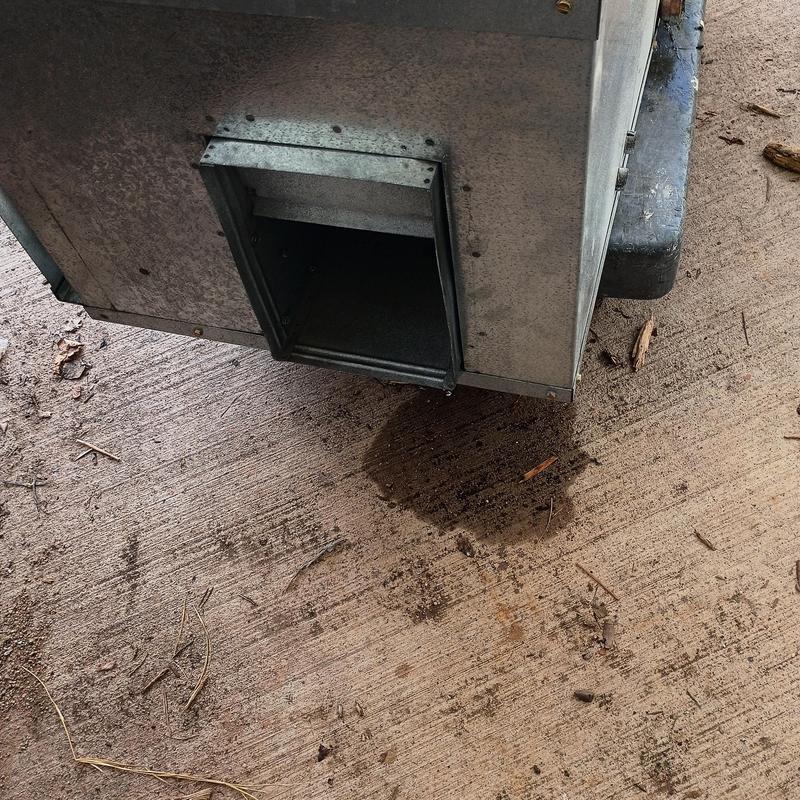 HVAC unit drainage leak on concrete floor HVAC unit drainage leak on concrete floor