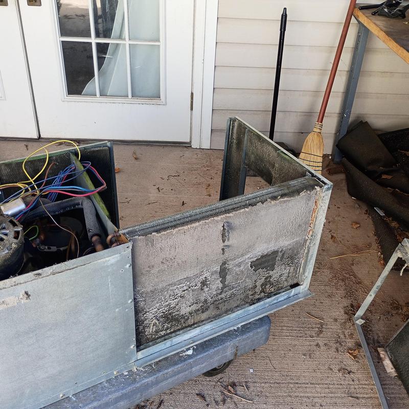 Evaporator coil with dirty buildup during HVAC repair Evaporator coil with dirty buildup during HVAC repair