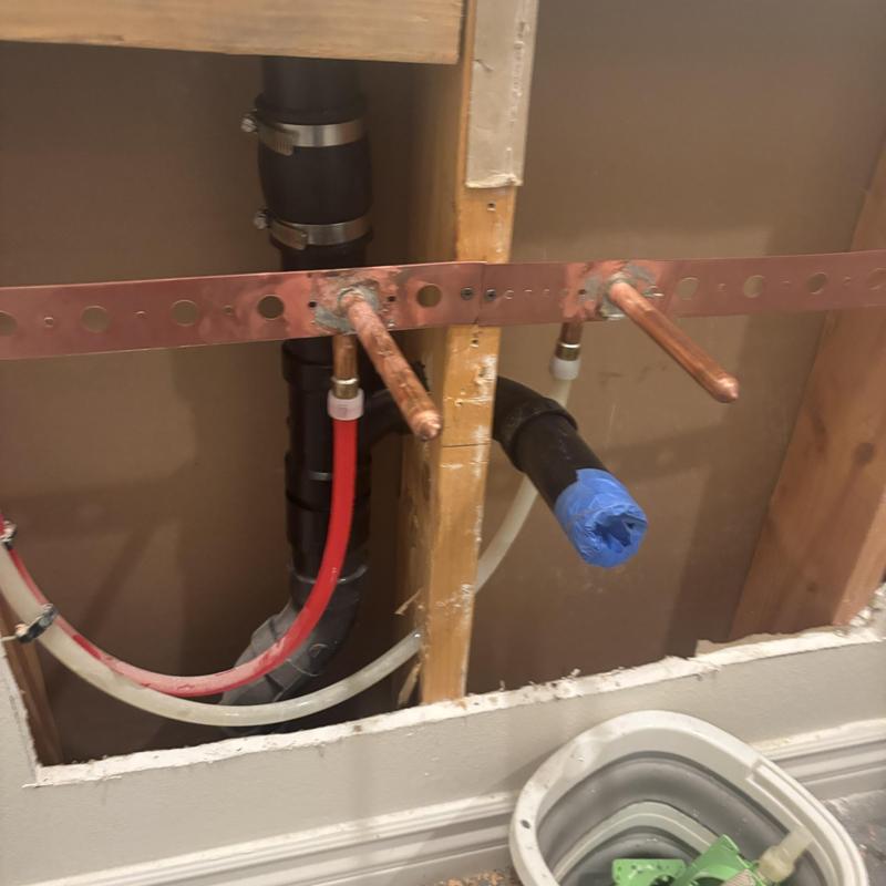 Copper water supply pipes with drain pipe and framing Copper water supply pipes with drain pipe and framing