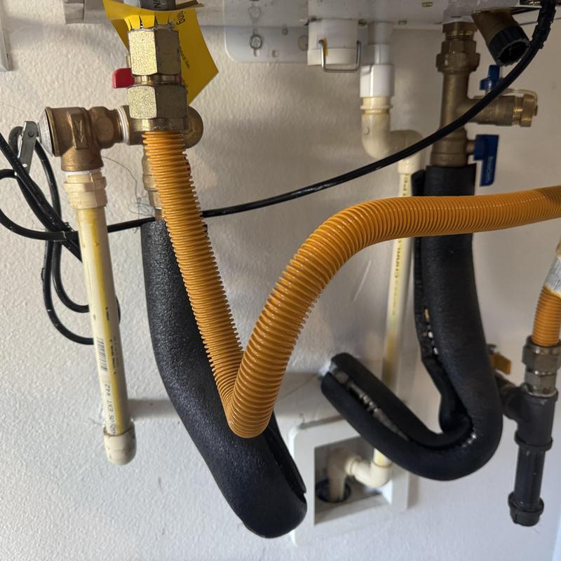 Navien heat exchanger gas and water lines installation Navien heat exchanger gas and water lines installation