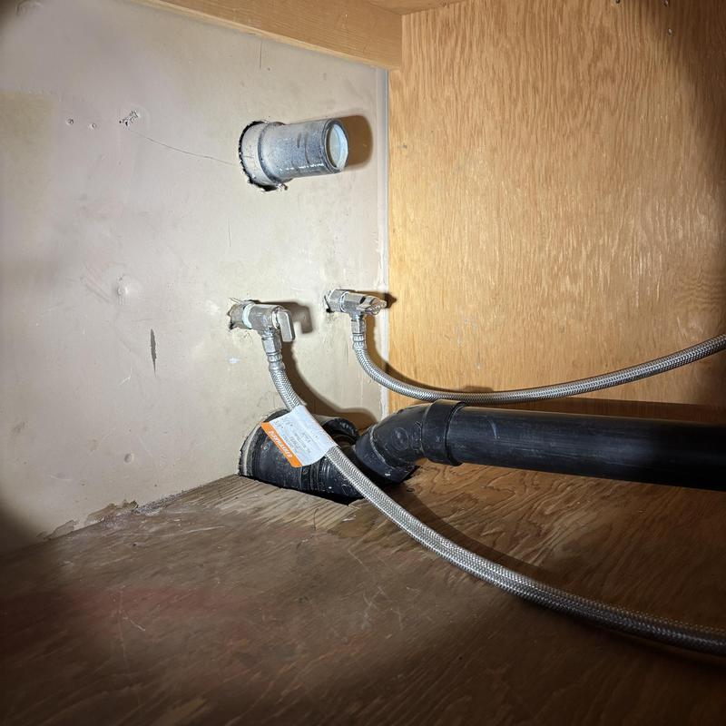 Water heater supply line with braided hoses and drain pipe Water heater supply line with braided hoses and drain pipe