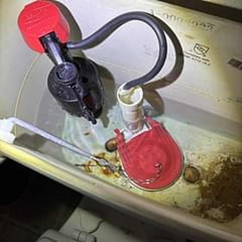 Toilet tank rebuild with new flapper and fill valve mechanism